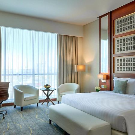 Hotel Dusitd2 Salwa Ad Dawhah Esterno foto A room at the hotel