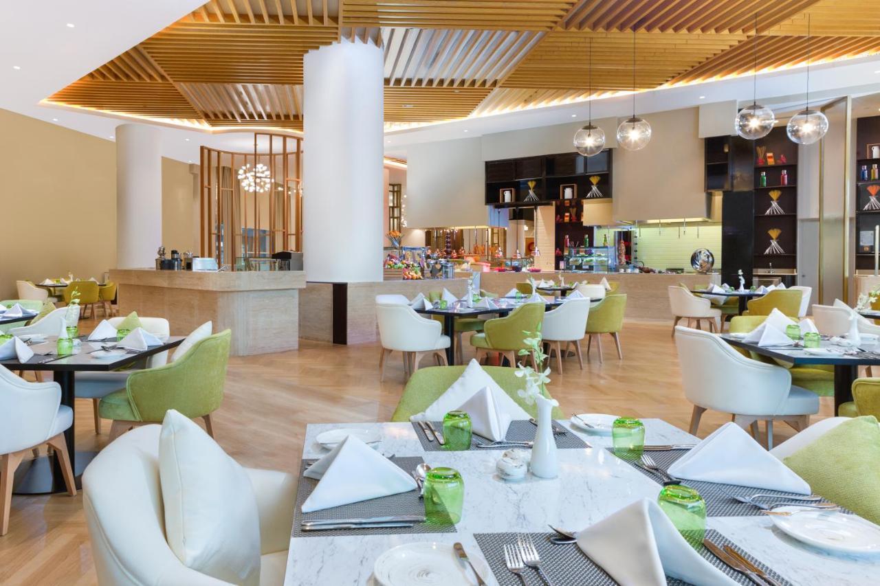Hotel Dusitd2 Salwa Ad Dawhah Esterno foto The restaurant
