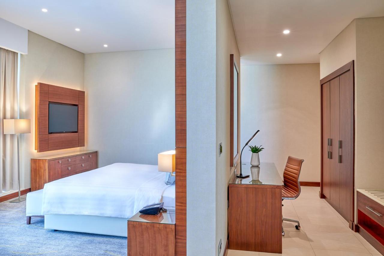 Hotel Dusitd2 Salwa Ad Dawhah Esterno foto A bedroom at the hotel
