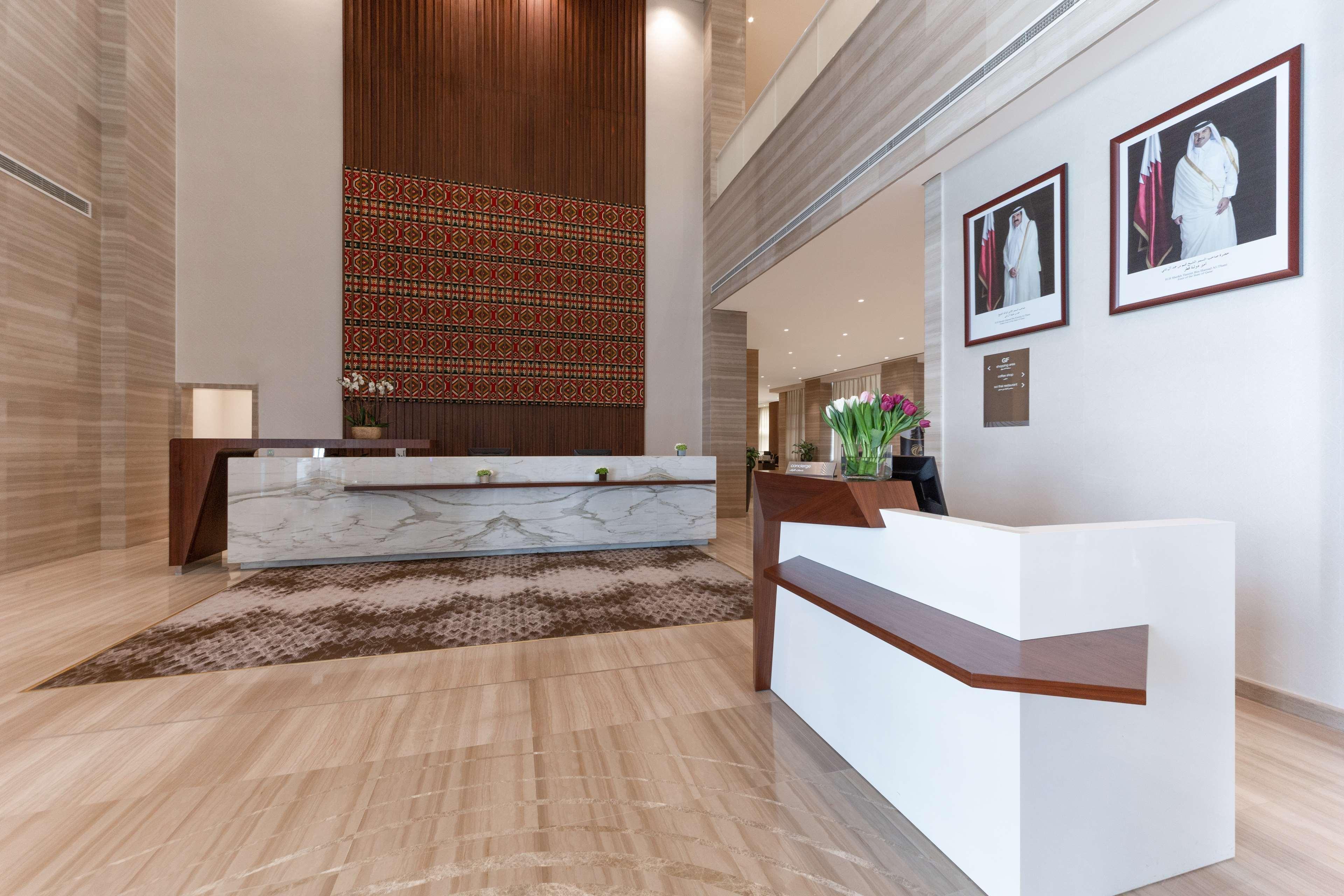 Hotel Dusitd2 Salwa Ad Dawhah Esterno foto 3D rendering of a hotel lobby