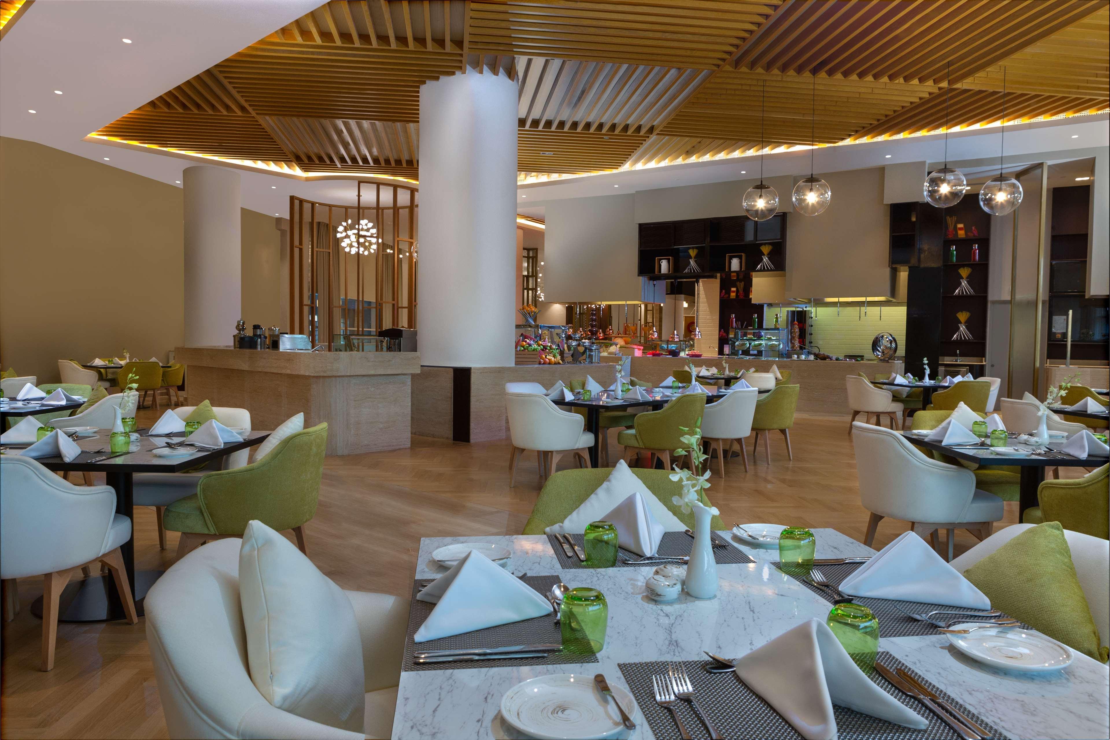 Hotel Dusitd2 Salwa Ad Dawhah Esterno foto The restaurant